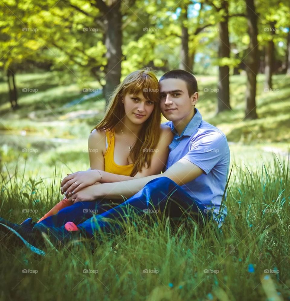 Photo session of a couple in love in a pastel blue T-shirt