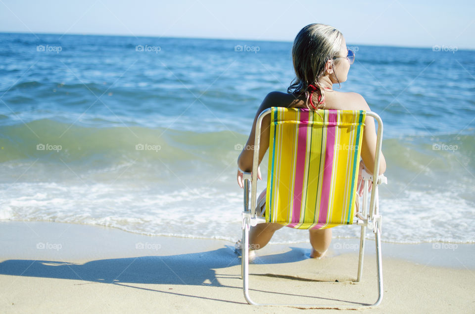 Woman relaxing at the beach
