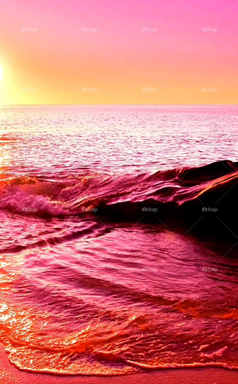 best evaning image of seashore view so beautiful colours ful cloud view so nice colour ful water waves