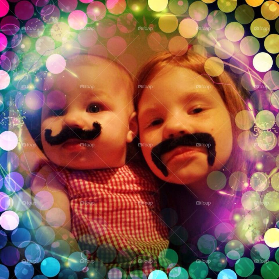 Funny Sisters. My daughters rockin mustaches