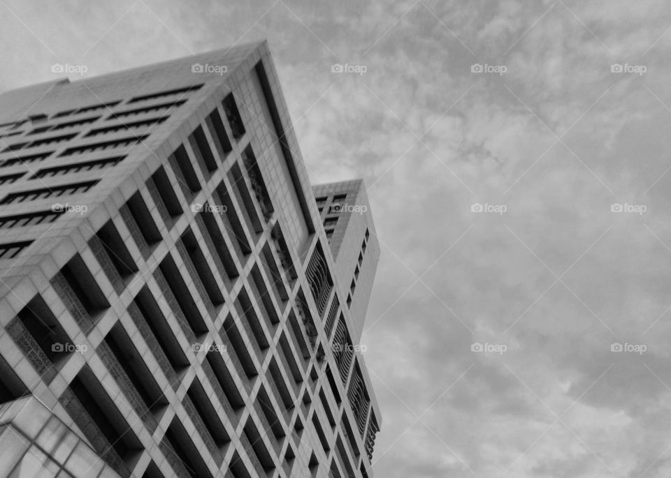 High building with cloudy sky