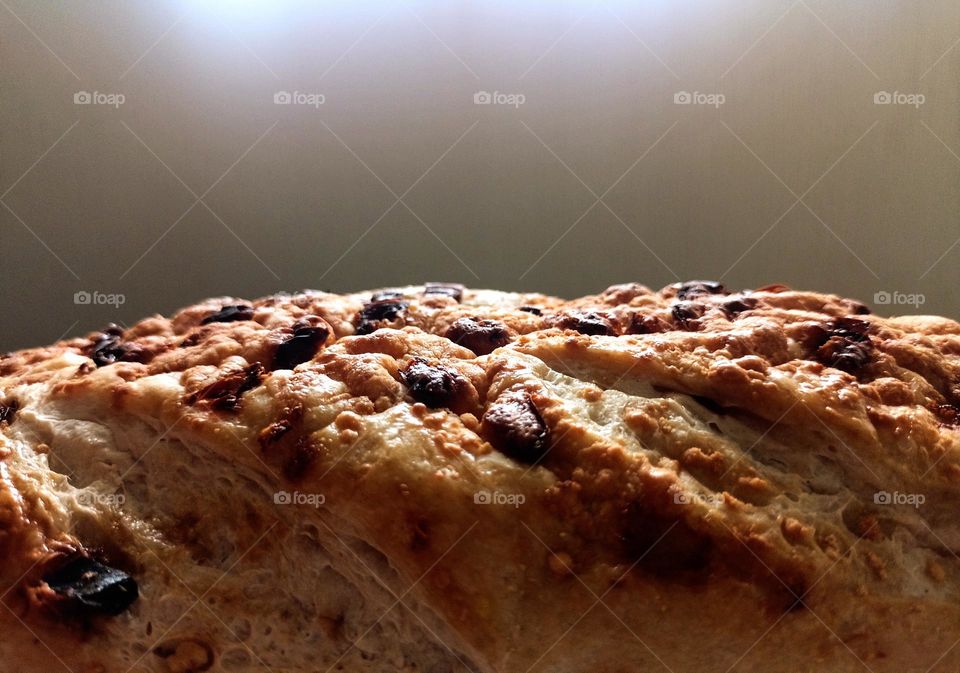 bread on a black background with lighting on it