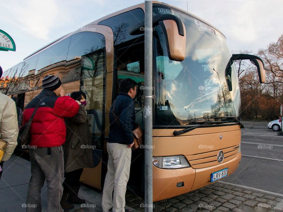 People taking the bus