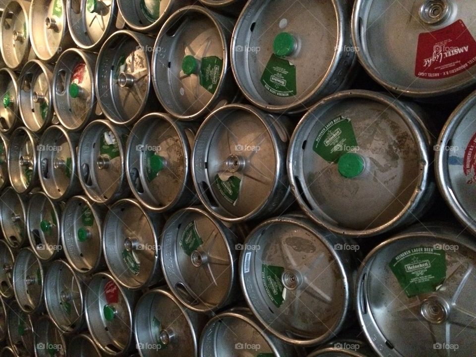 Wall of beer kegs