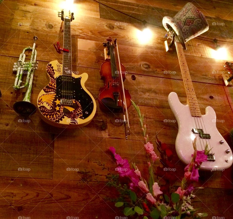 Wall with guitar and trumpet 