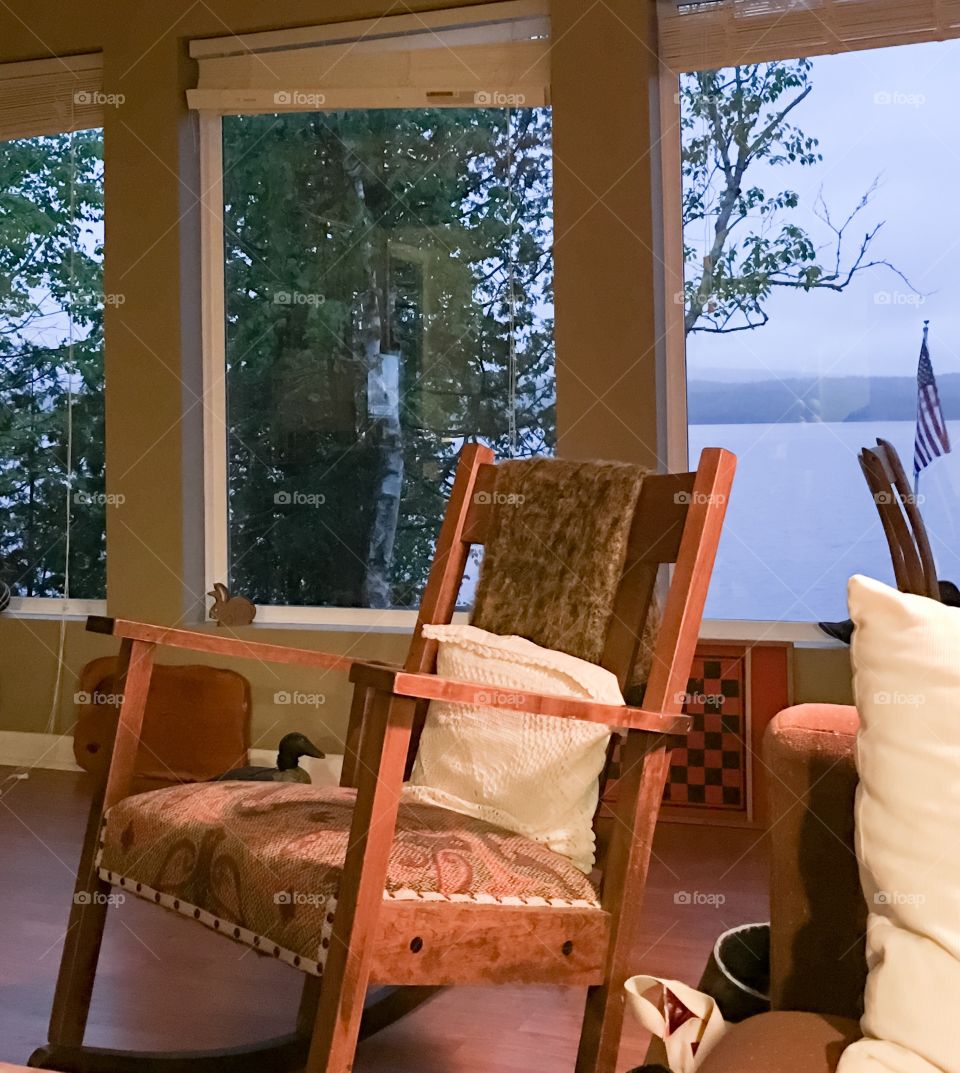 Country cottage interior with Windows looking onto the lake