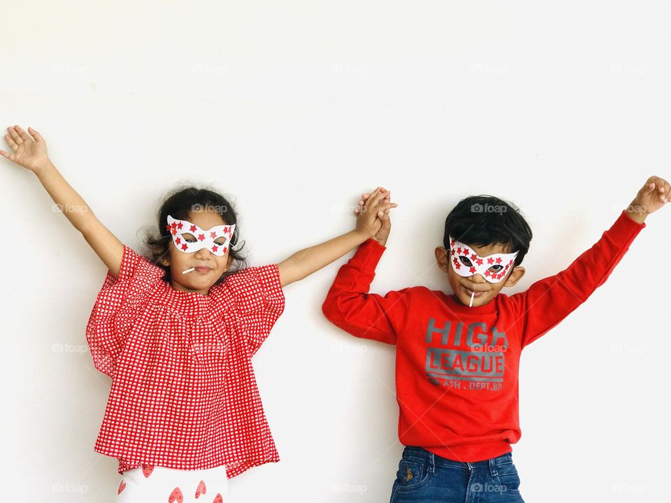 Hand made party eye masks red and white combination.