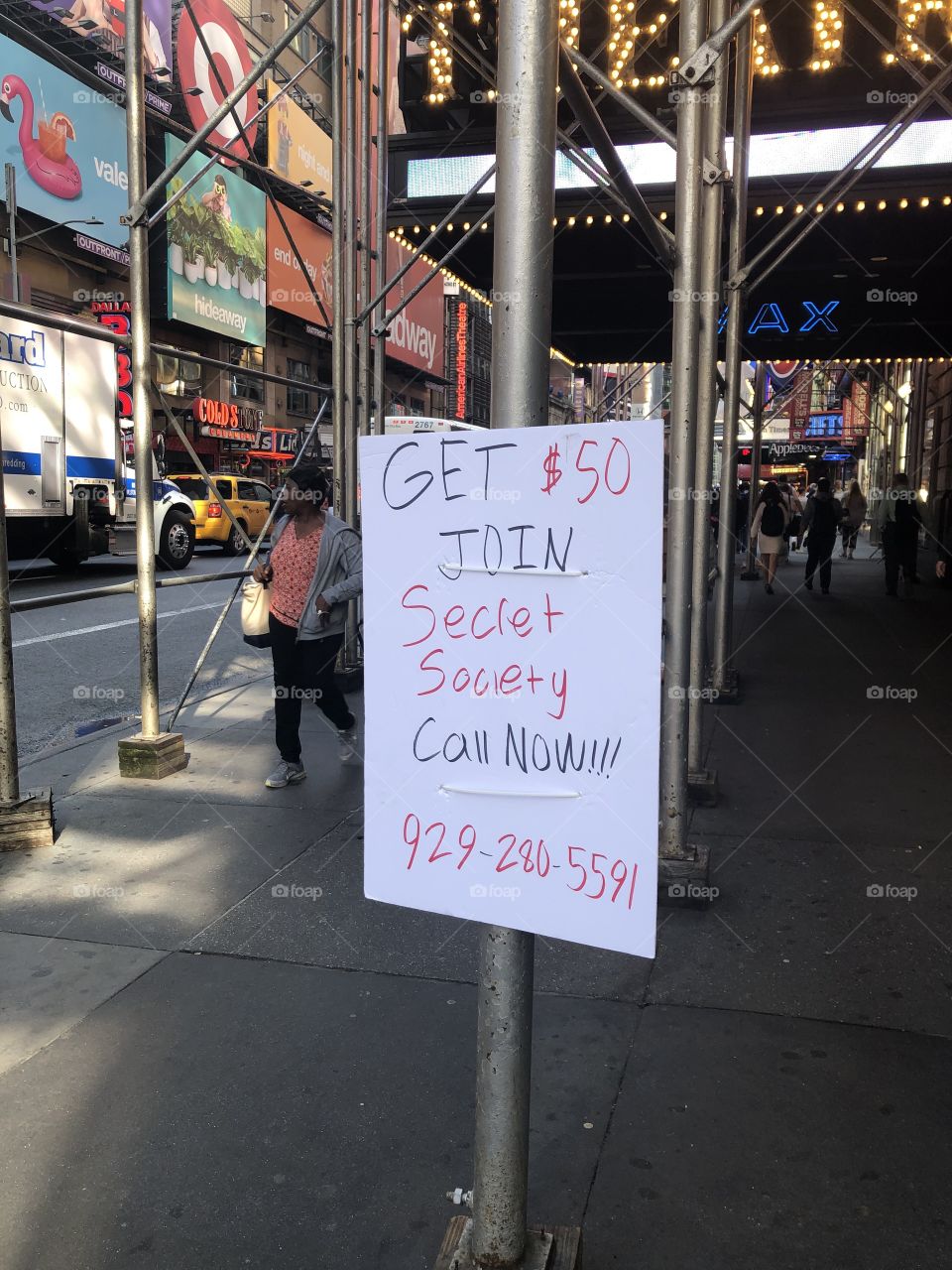 Secret society Times Square ad