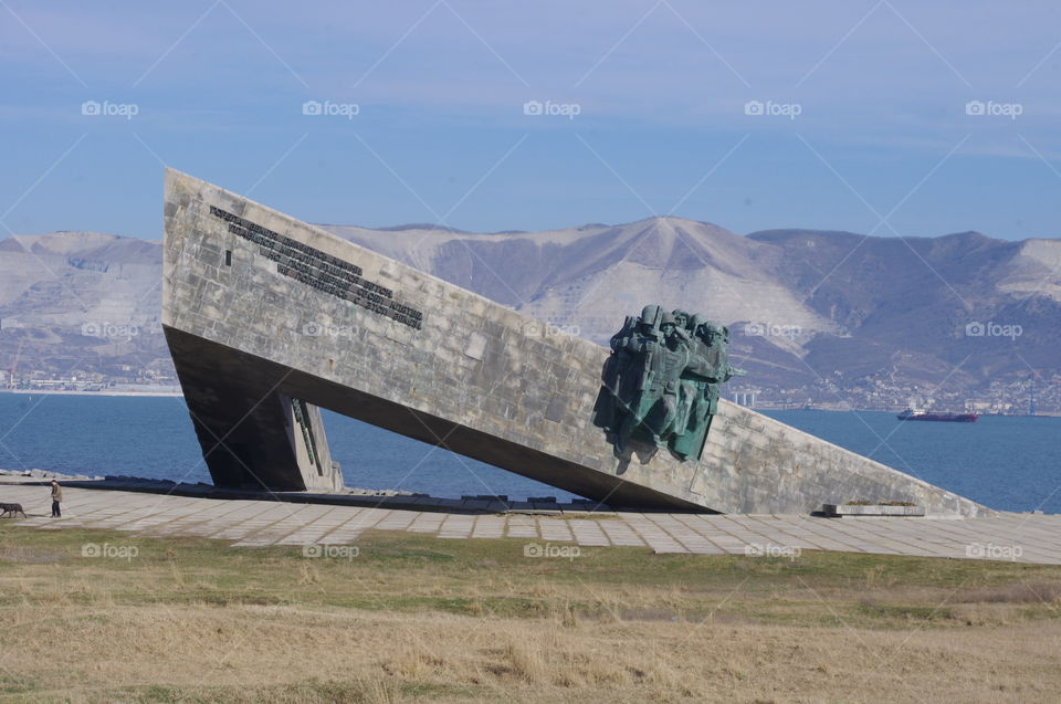 Novorossiysk. Malaya Zemlya. A monument to the liberators of the city from the Nazi invaders. against the backdrop of Tsemesskaya bay of the Black Sea.