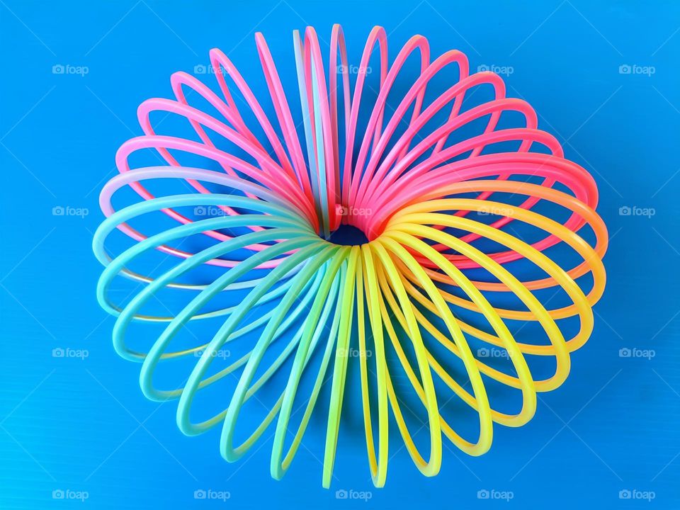 overhead view  of a magic spring on blue background.