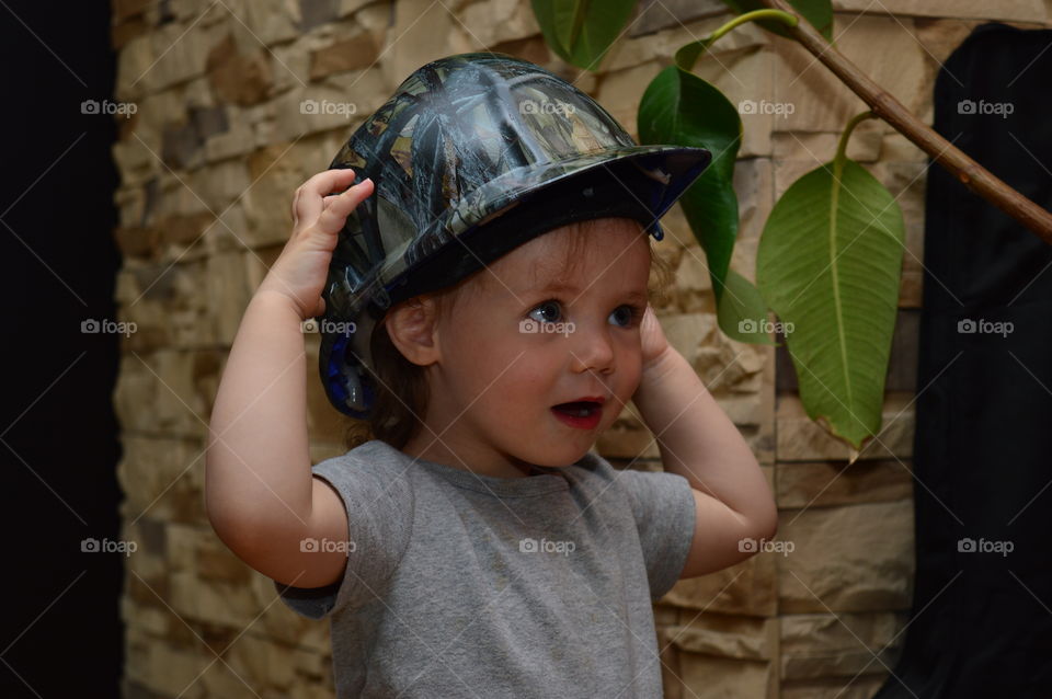 Child in a unique helmet