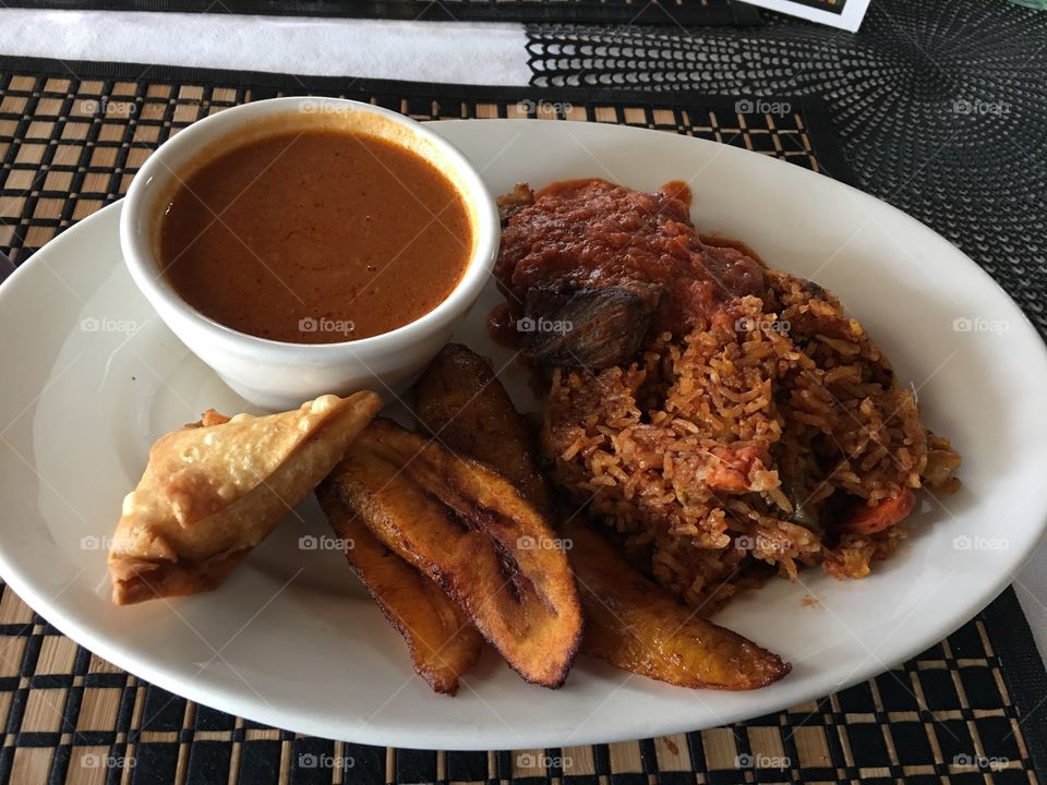 Sample Plate @ African Cafe in Denver CO
Rice, Lamb with Spicy Stew, Peanut Soup, Samosa, Fried Plantains