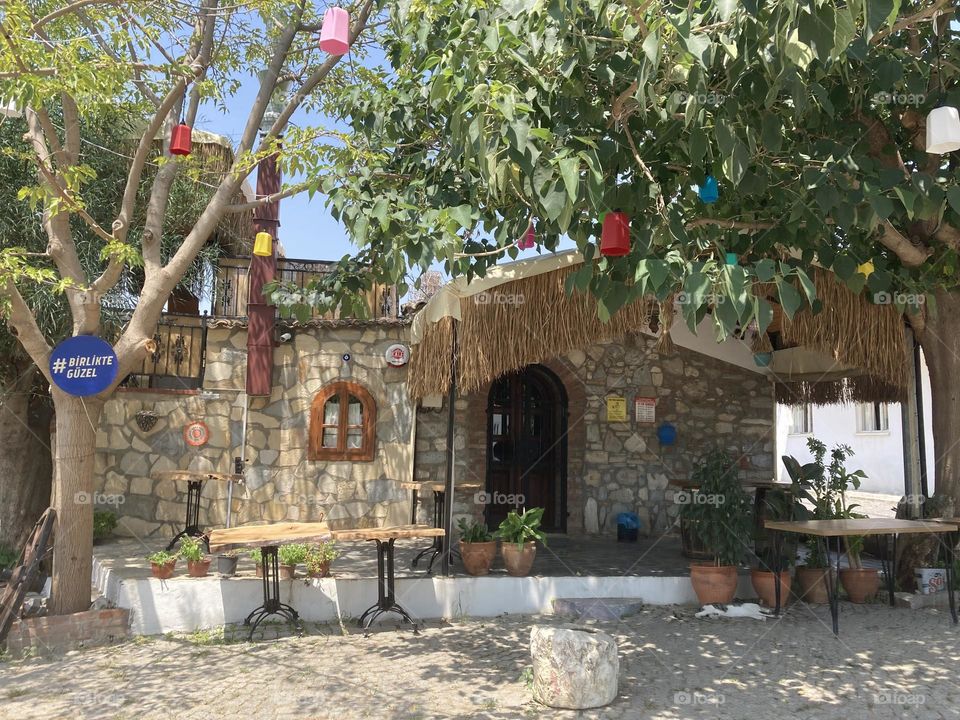 Beach time on holidays. Blue sky and tall palm trees. Sunsets and sunny days. Summertime in Kusadasi. Vacation travel in Turkey . Summer view. Sunny day during vacation 