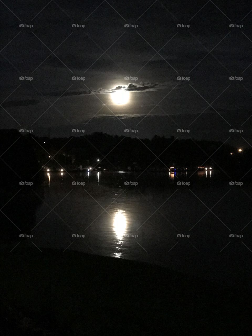 Moon shimmering across the lake