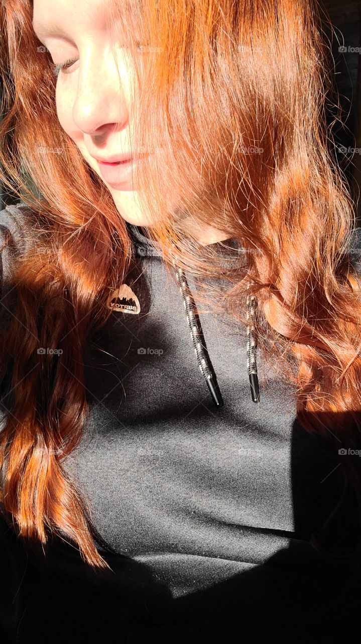 Ginger curls in the springtime sunshine