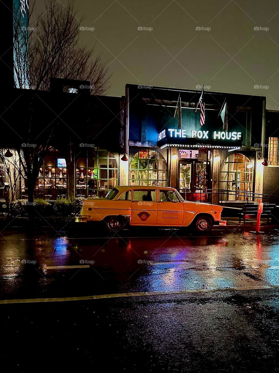 This is “THE BOX HOUSE HOTEL” on “Box Street” in “Greenpoint”, Bklyn. In old style elegance flags are waving above the entrance and there is always at least one yellow cab parked up front to be of service. 2023. Hypnotic Productions