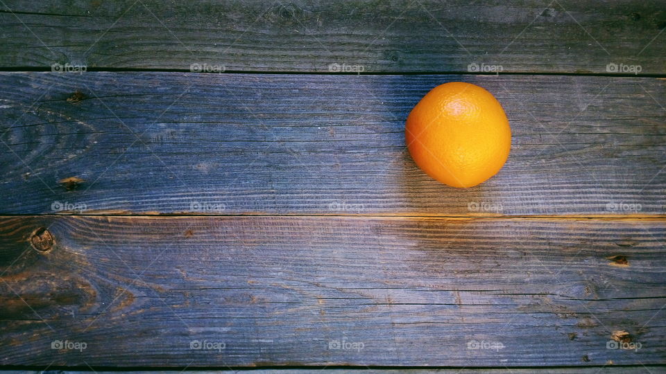 Orange on old boards