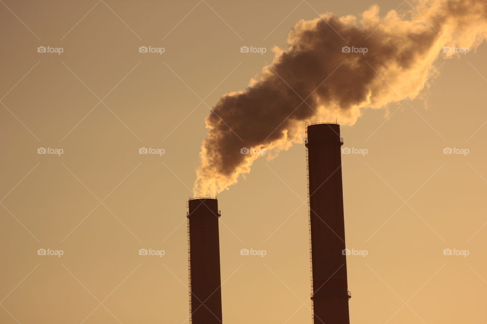 factory smoke at dawn