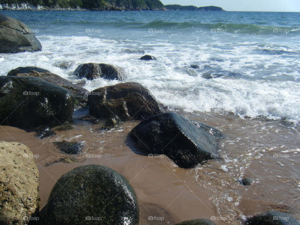 beach ocean canada rocks by dixieyankee