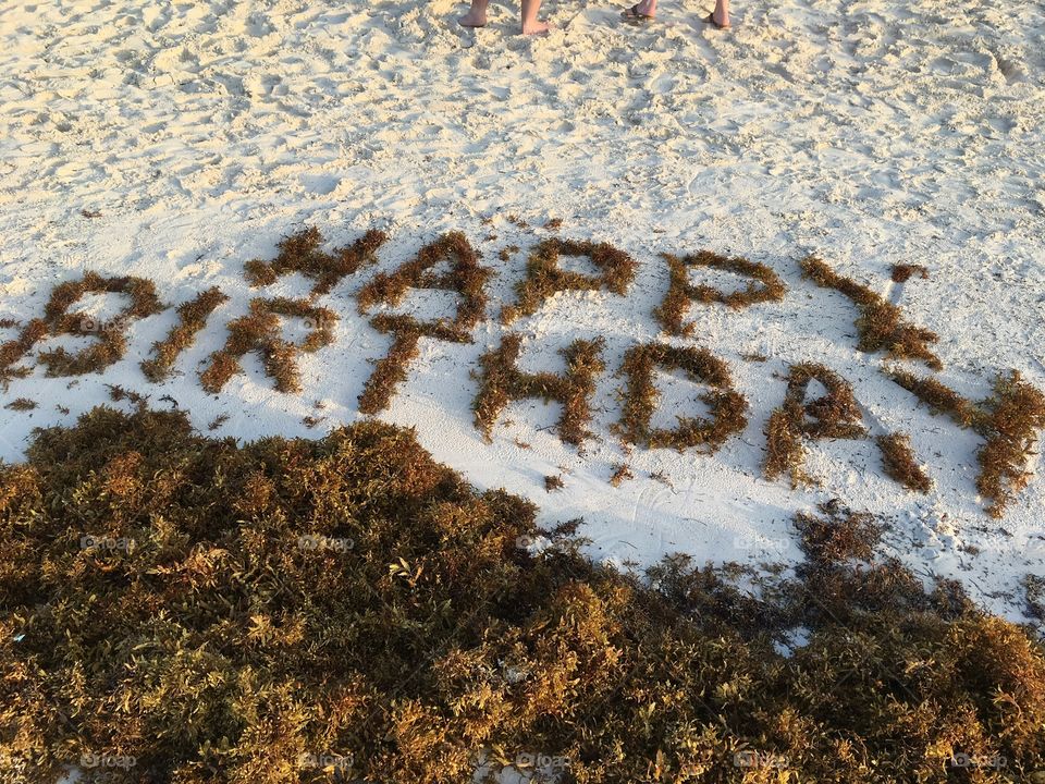 Happy Birthday at a tropical beach