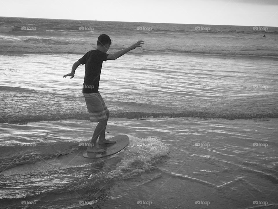 Skim boarding