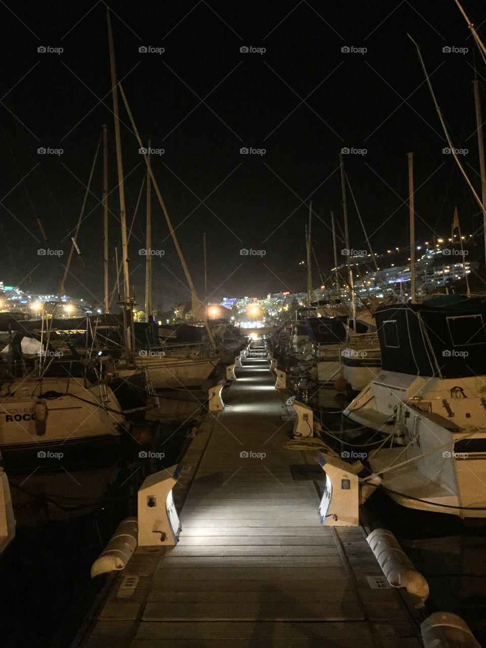 The  beautiful boats at night in the harbor