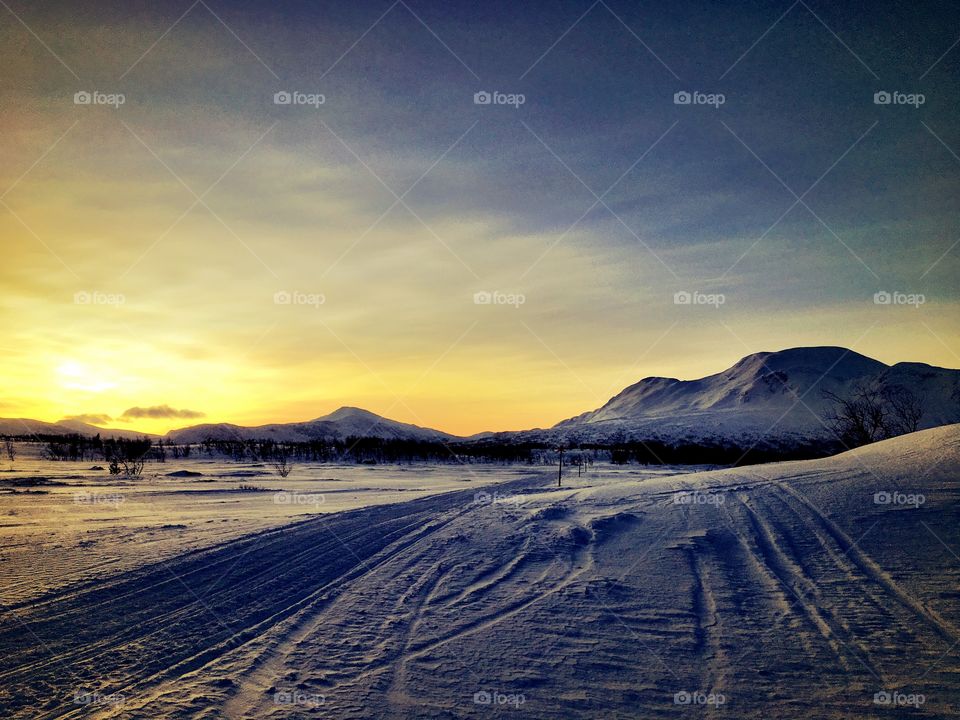 Sunset in winter landscape 