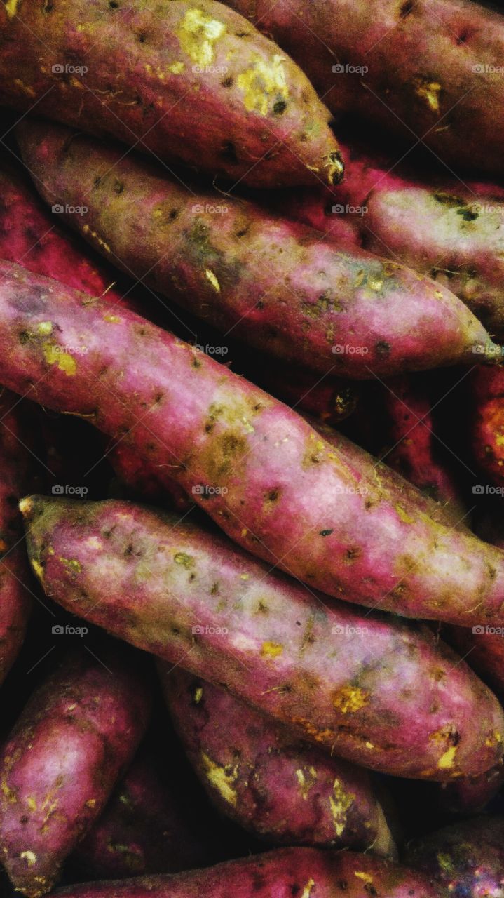 Fresh purple yam are sold in the market