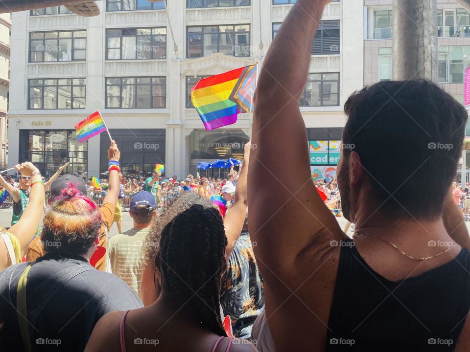 Crowd cheering at the NYC gay pride parade 