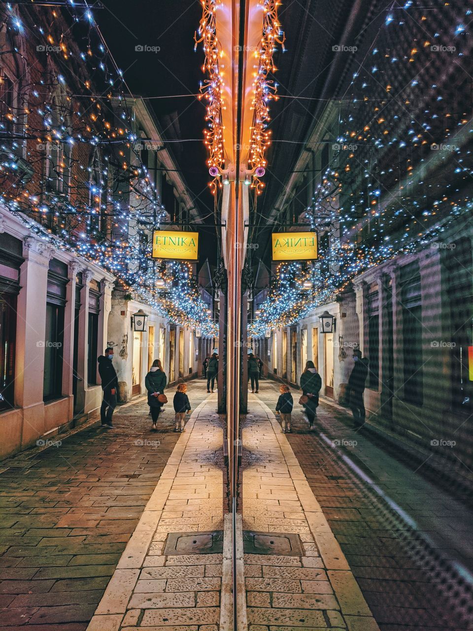 Christmas lights in the Koper, city in the adriatic seaside in 2020. Christmas time. Winter postcard.