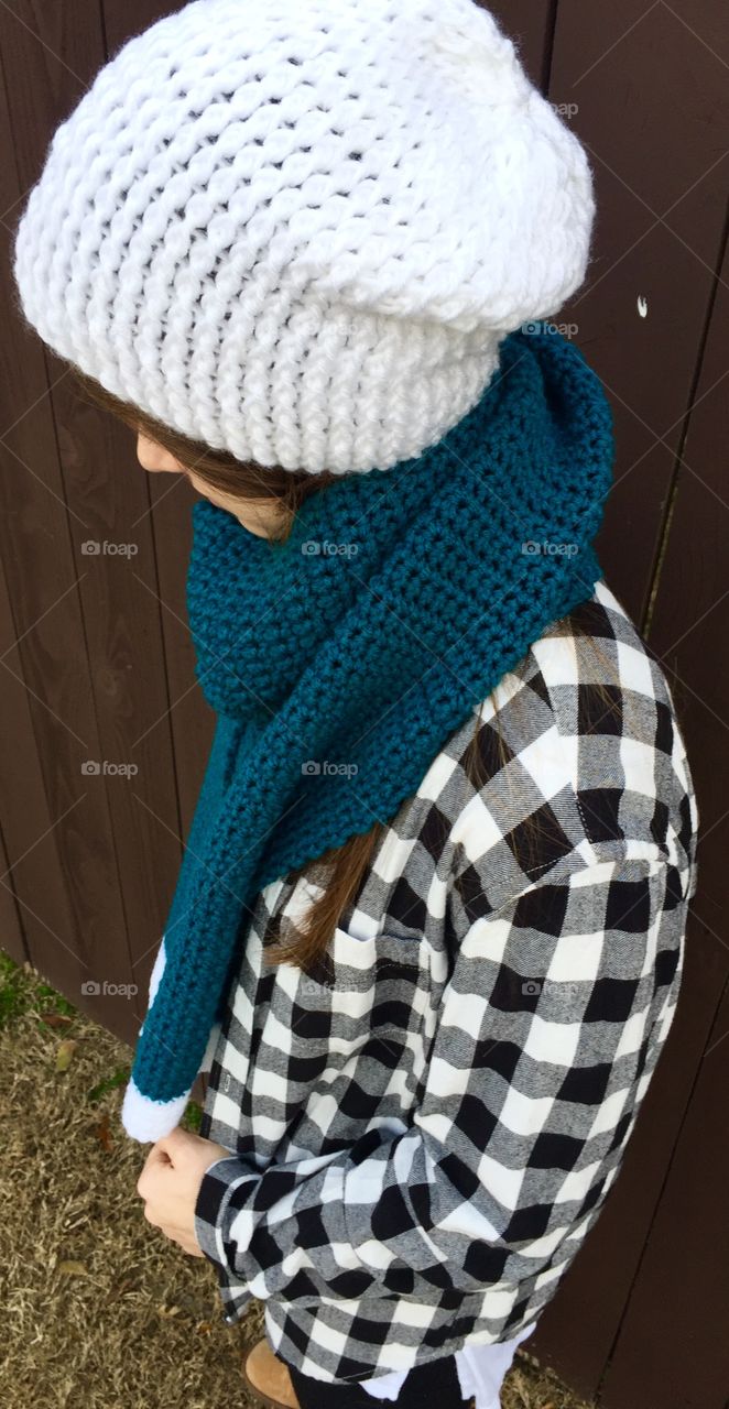 Elevated view of a teenage girl wearing woolly cap