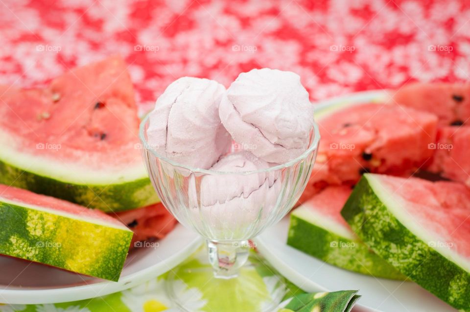 Freshly made watermelon flavored ice cream good in the summer.