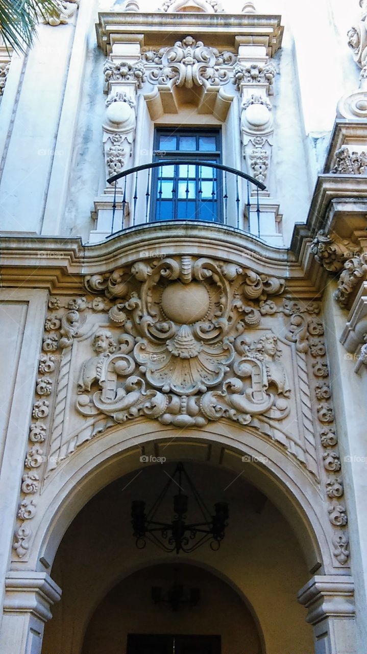 Macro - one of the arches and a balcony of the Casa del Prado in Balboa Park, San Diego, CA.