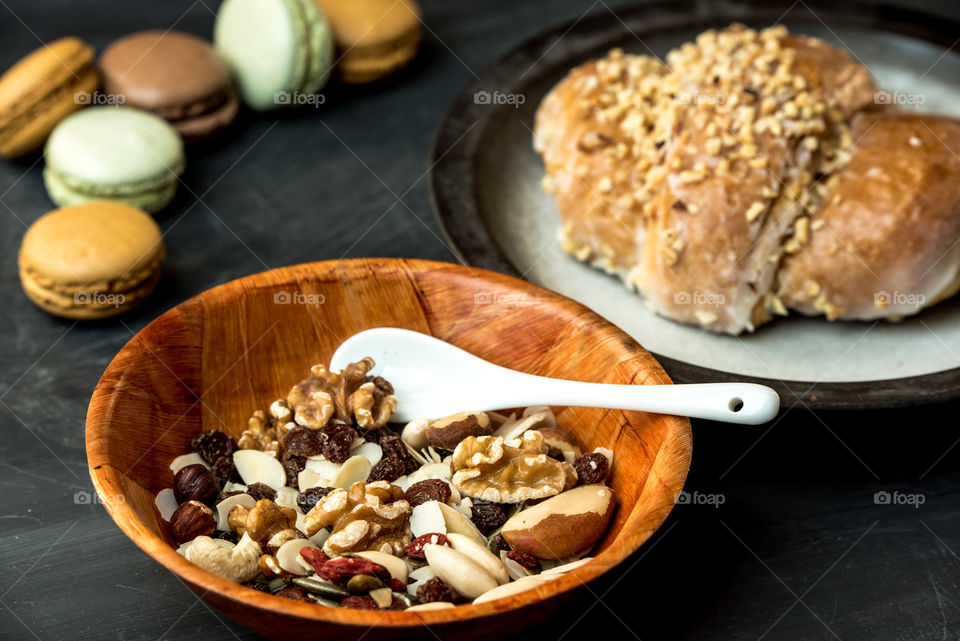 sweet bagel with nuts, a fragment of a table with breakfast