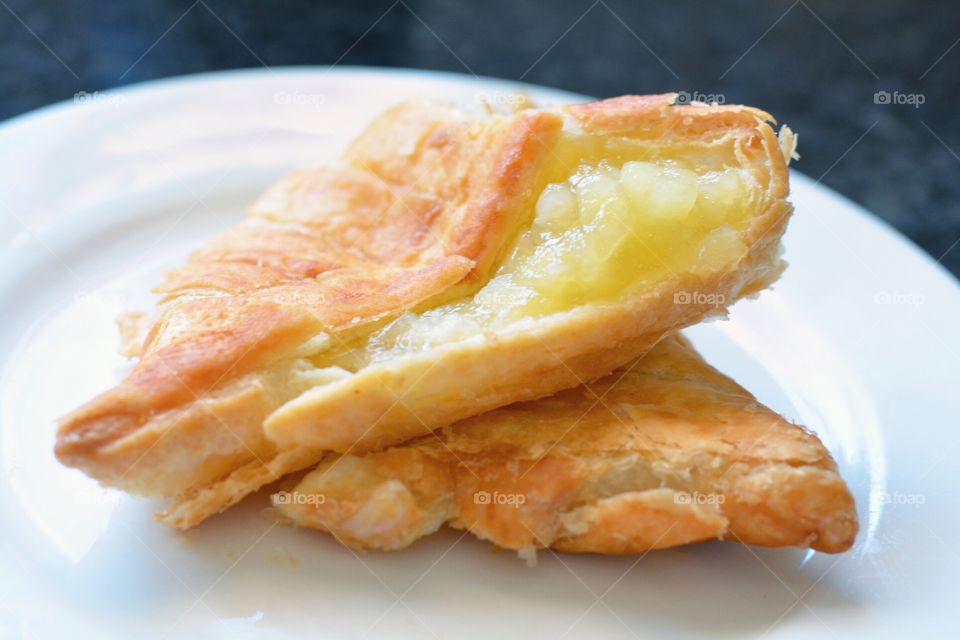Apple turnover on a white plate