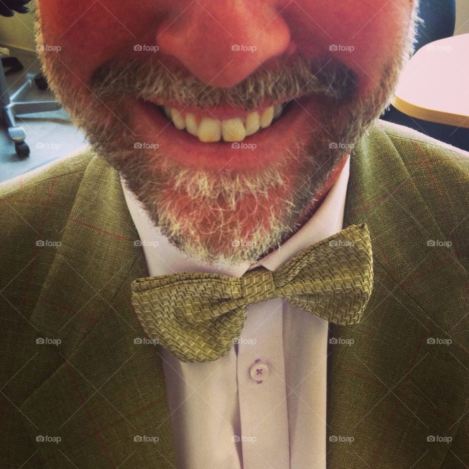 Happy man with bow tie.