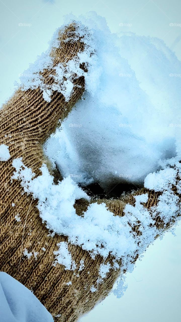 a fist full of snow
