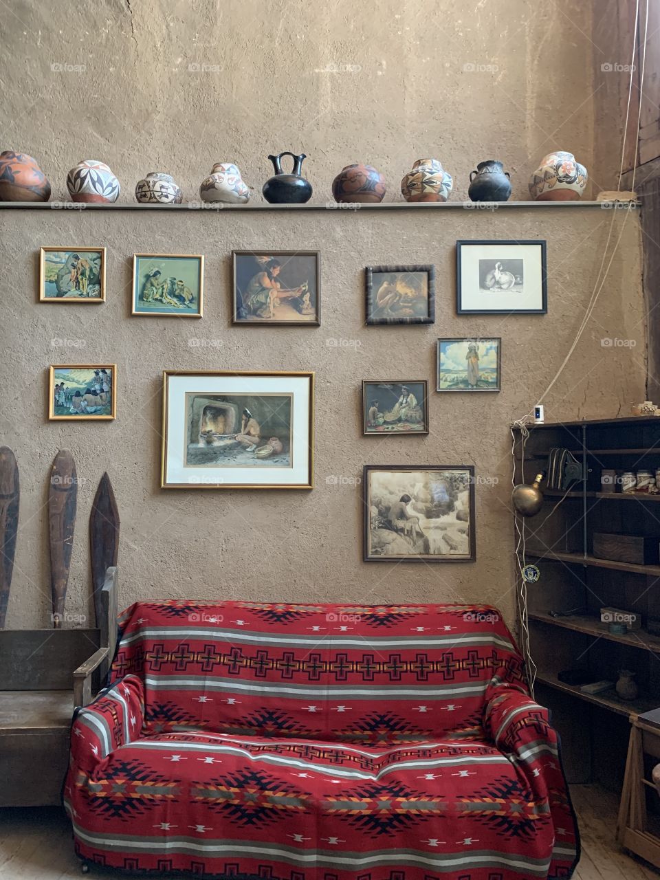 Neutral colors and a red couch