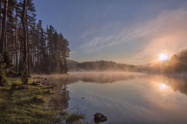 Scenic view of lake at sunrise