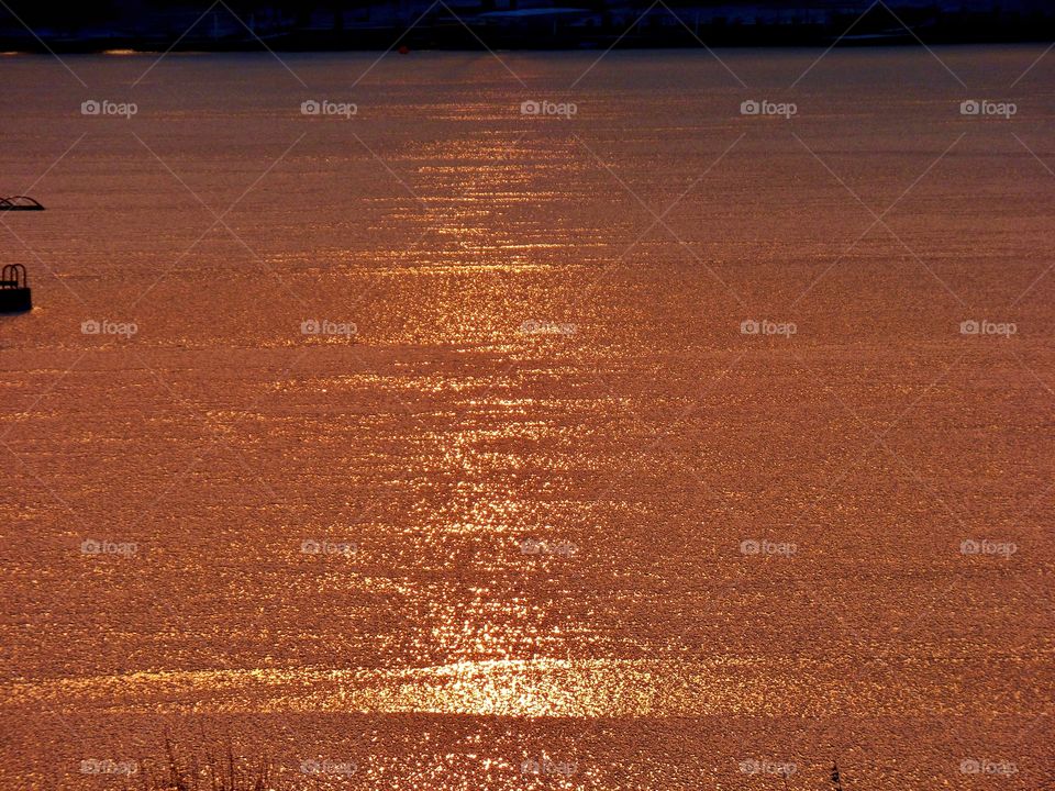 Beautiful Jews of the frozen lake at sunset
