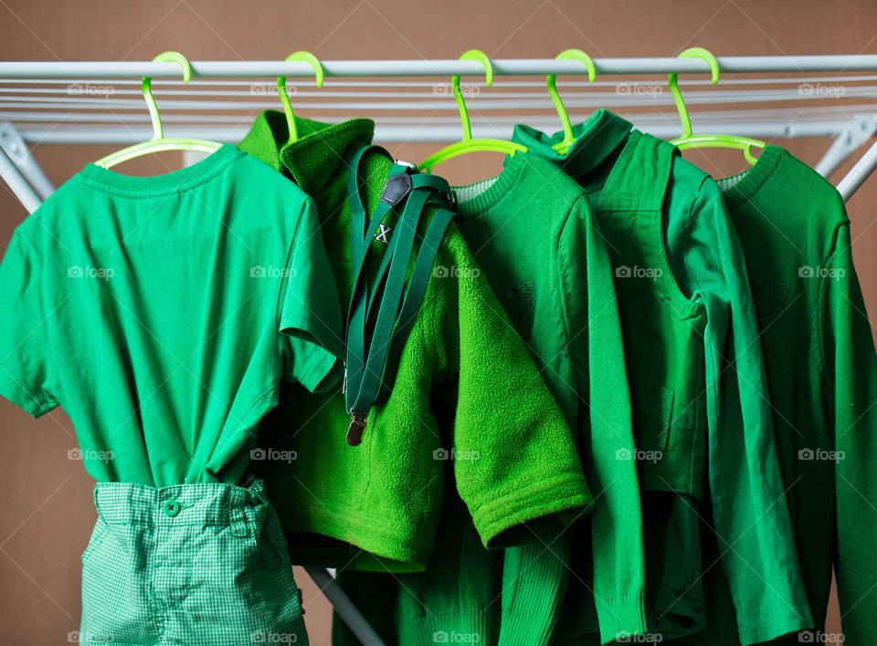 Repetition of green boys dress