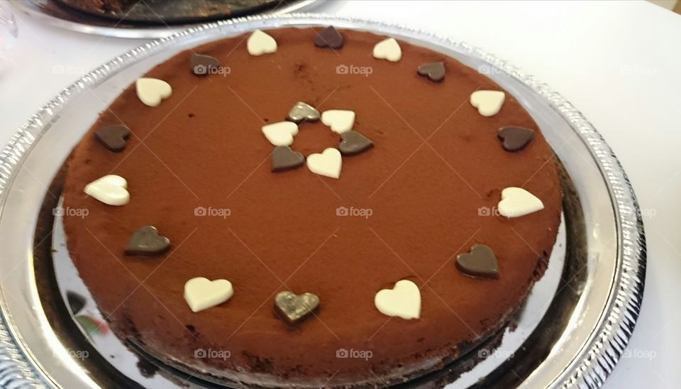 chocolate cake with heart decorations