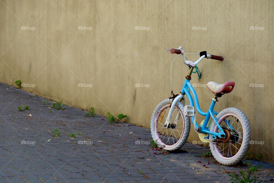 Baby blue and pink kids lonely bicycle 