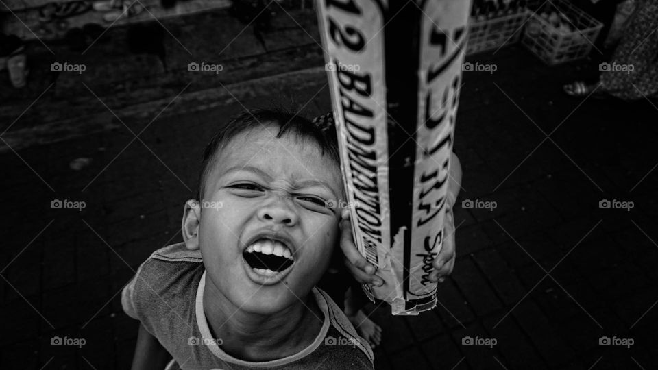 a child who showed a disgusted expression because of his friend's words