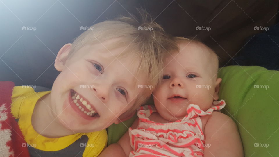 Portrait of a happy brother and his sister
