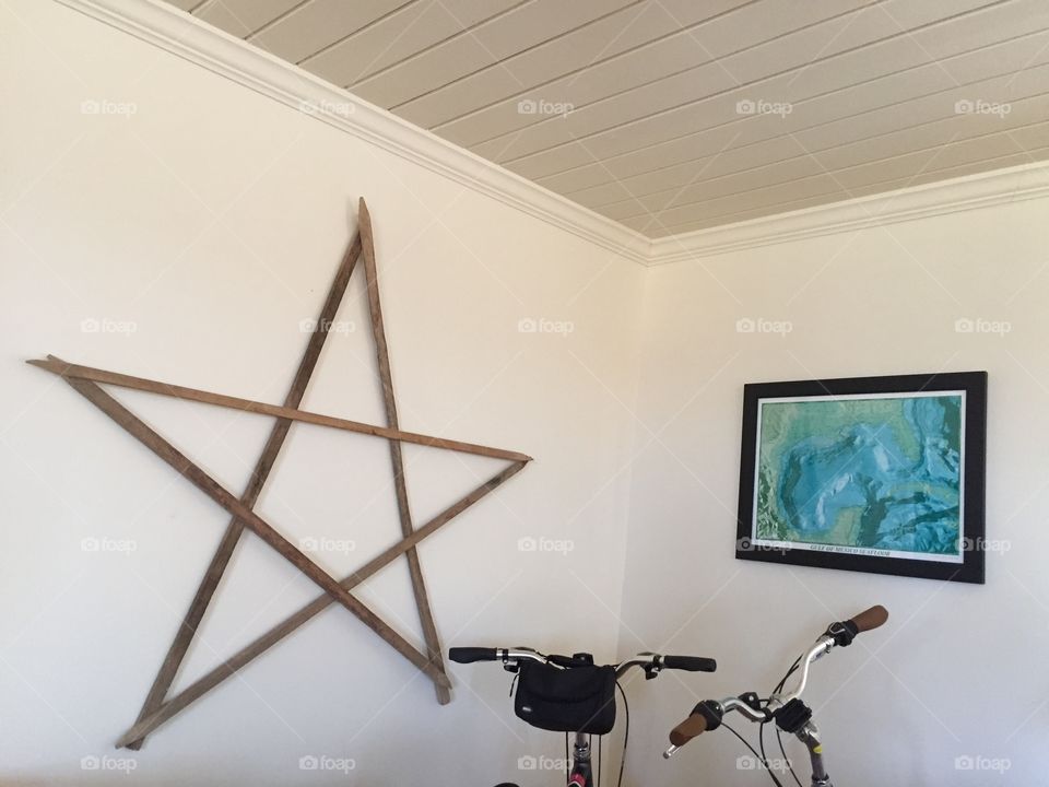 Star and art on wall in an apartment 