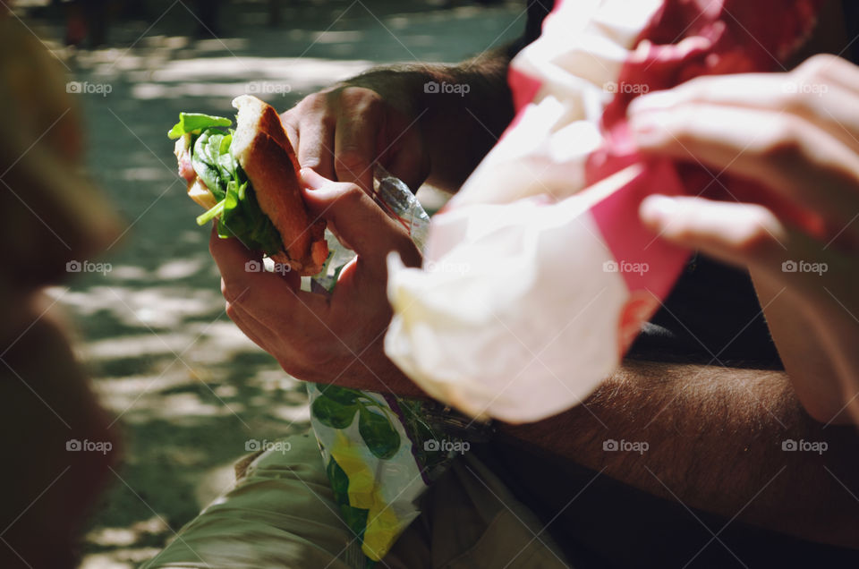 Eating sandwiches in a park in Paris