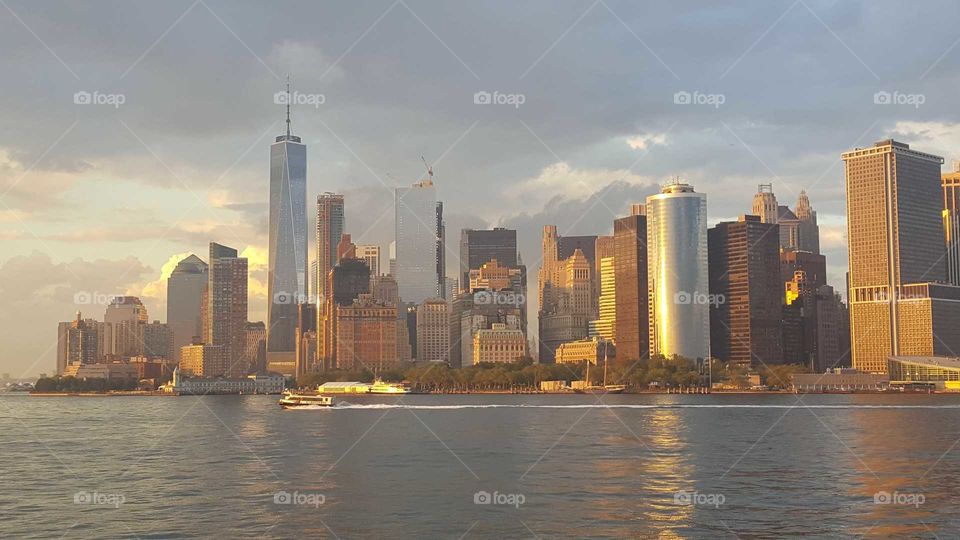 I took this photo of Lower Manhattan during sunset from onboard the Staten Island Ferry!