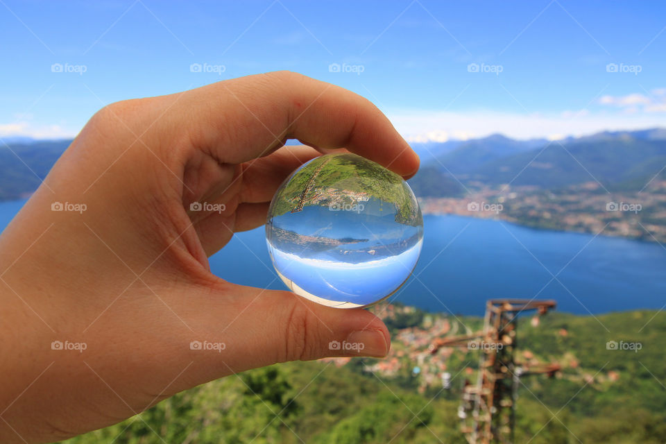 Crystal ball overlooking Lake Maggiore, Italy