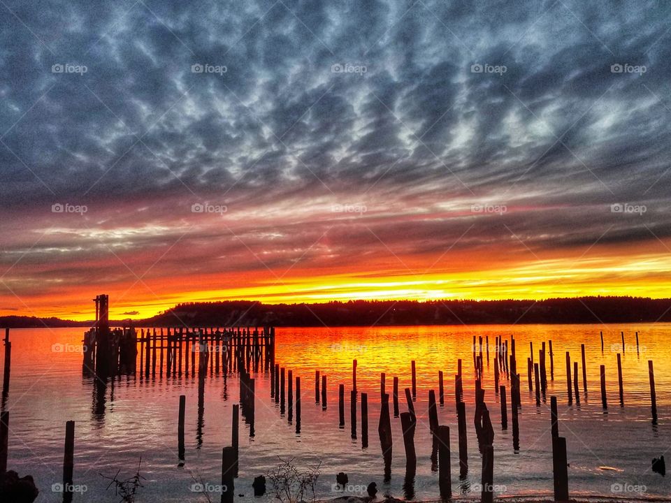 A bold, beautiful, ominous & fiery sky caught during the sunset hour.